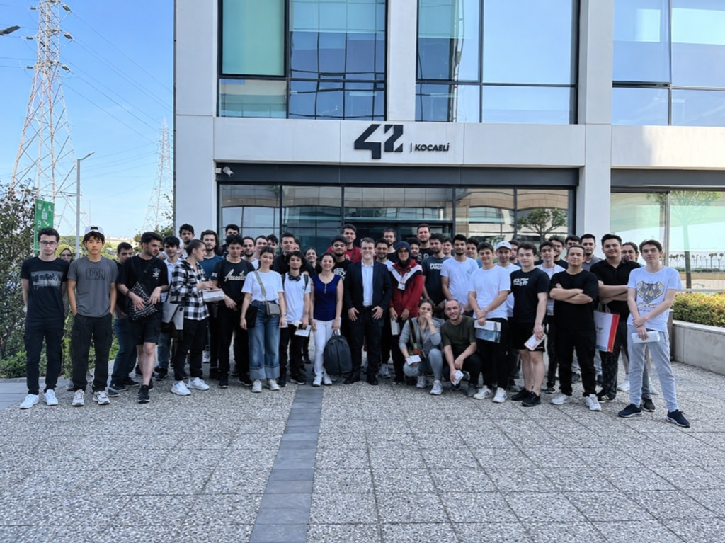 Eymen Karatas with colleagues at the OBSS office